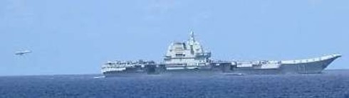 A PLAN Shenyang J-15 carrier-based fighter aircraft is preparing to land on Chinese aircraft carrier PLANS Shandong (CV-17) 20230915.jpg
